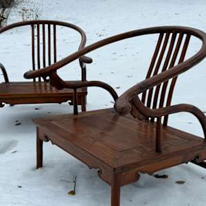 Pair of 19th century Chinese hardwood horseshoe low chairs