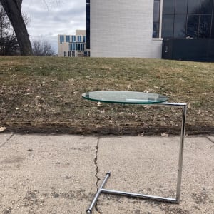 Steel chrome side table with round glass top 