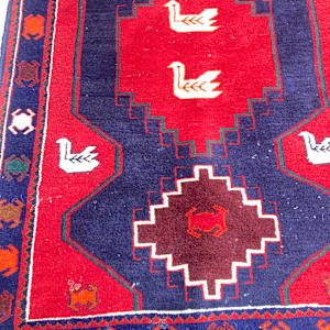 Vintage handmade rug with swans 