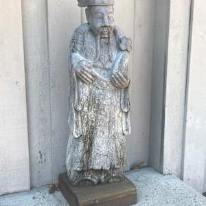 Carved wooden Asian figure