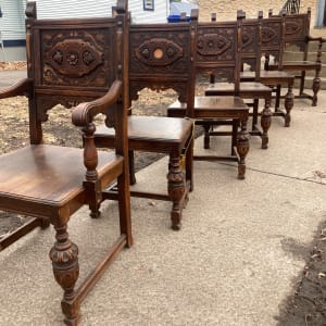 Carved oak dining room chairs 