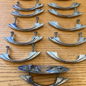 Set of 13 arched silver handles 