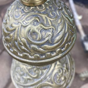 Ornate brass fireplace andirons 