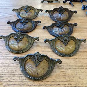 Set of 7 Art Deco ornate handles with bakelite 