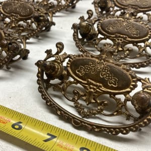 Set of 8 ornate handles 
