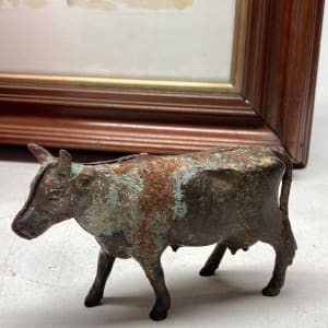 Cast iron cow penny bank