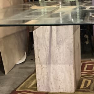 Post modern Travertine base glass top dining room table 