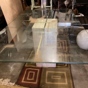 Post modern Travertine base glass top dining room table 