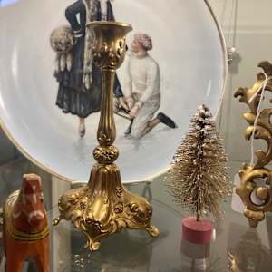 pair of small gold candle sticks 