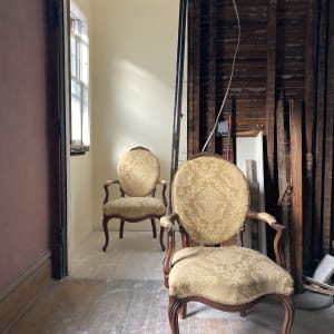 Pair of upholstered ornate medallion back chairs 