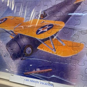 box of 12 airplane puzzles 