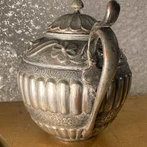 Ornate tin lined copper teapot 