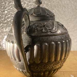 Ornate tin lined copper teapot 