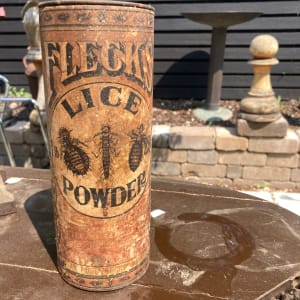 Flecks Lice powder advertisement container