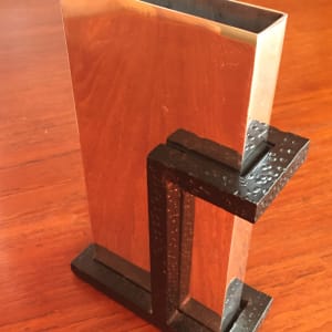 Chrome and black sculpture vase by Aram