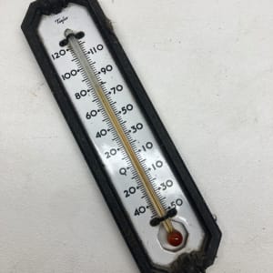 vintage metal and porcelain thermometer 