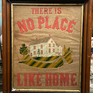 Framed cross-stitch "There Is No Place Like Home" 