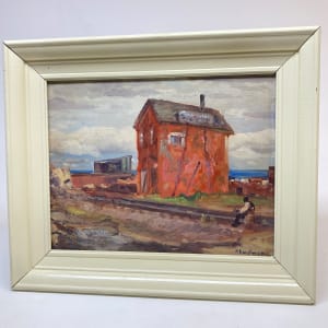 Framed rail yard painting with red building on board 