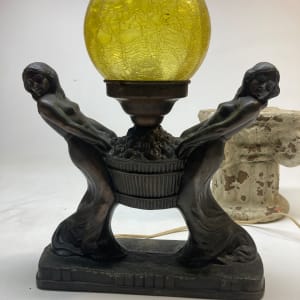 Art Deco woman light with yellow globe 