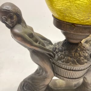 Art Deco woman light with yellow globe 