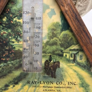Framed Ray Lyon thermometer 