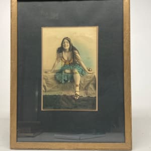 Framed hand colored photograph of a woman 