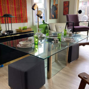 PACE glass top dining table designed by Leon Rosen 