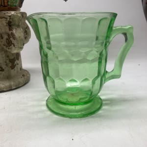 Green glass water pitcher