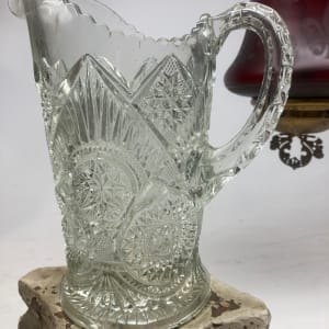 cut glass clear ornate water pitcher