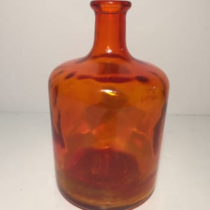 Blenko style orange bottle shaped vase 