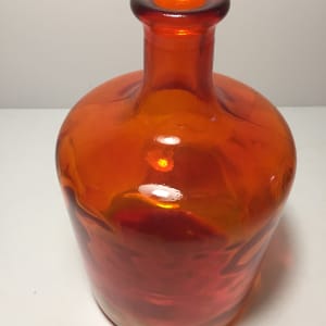 Blenko style orange bottle shaped vase 