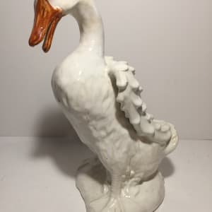 Pair of pottery geese figures 