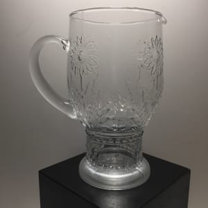 Art glass clear pitcher with pressed flowers 