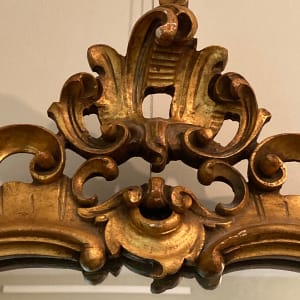 Carved ornate gold mirror 