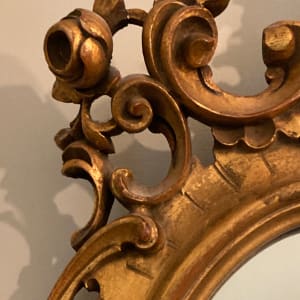 Carved ornate gold mirror 