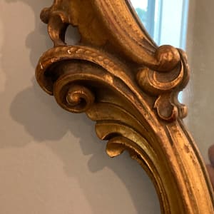 Carved ornate gold mirror 