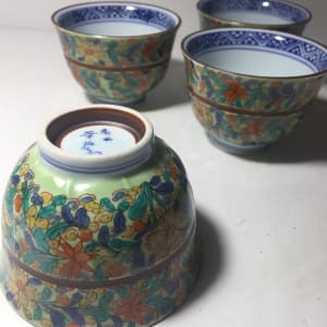 4 matching asian saki cups 