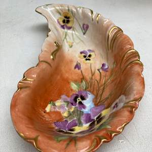 hand decorated orange low comma shaped dish