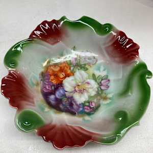 Hand decorated serving bowl with red and green accents