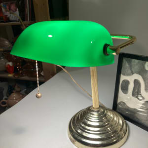 Emerald green light with brass base 