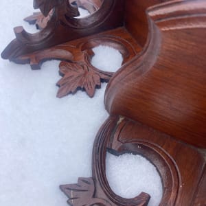 pair of Victorian walnut Black Forest wall shelves 