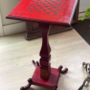 Primitive red painted chess table 