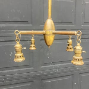 turn of the century brass chandelier 