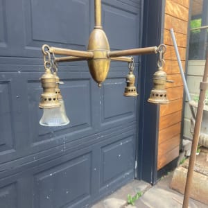 turn of the century brass chandelier 