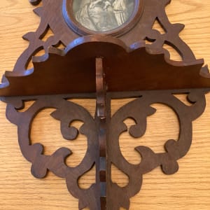 Victorian walnut wall shelf with cut outs 
