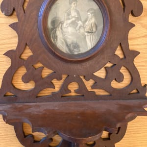 Victorian walnut wall shelf with cut outs 