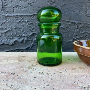 Belgian green covered bottle