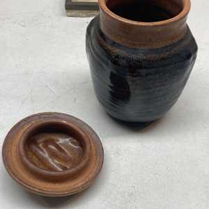 hand made covered pottery vase 