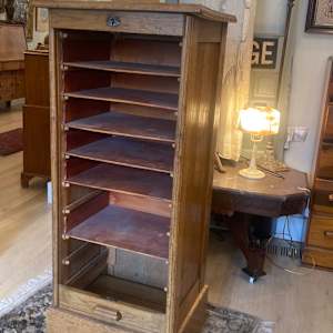 Narrow oak sheet music cabinet 