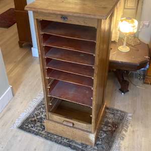 Narrow oak sheet music cabinet 